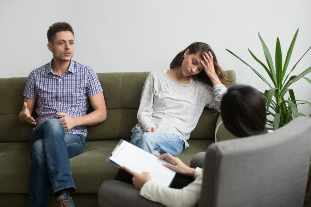 couple receiving psychological help from expert